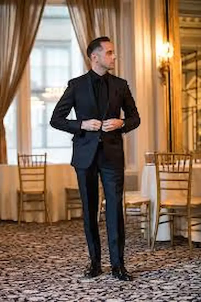 Man in all black suit